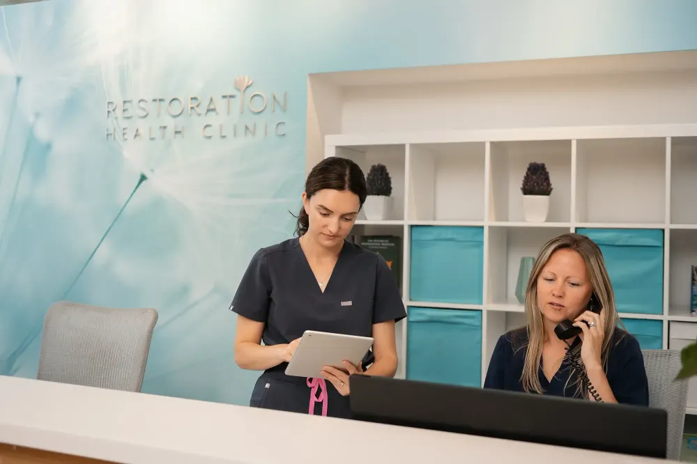Example of an action shot of staff at the front desk, helping create a natural looking photo