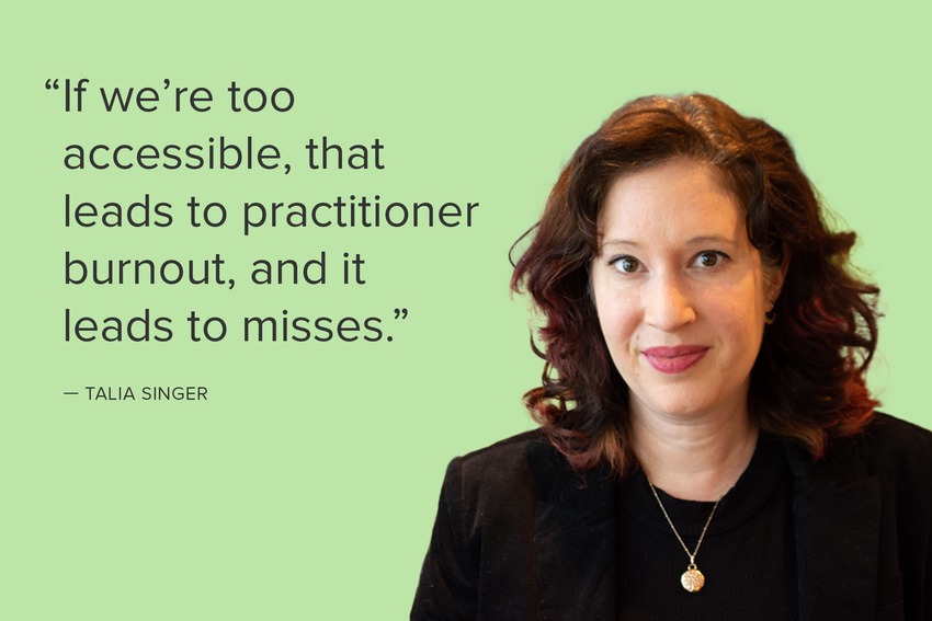 Therapist Talia Singer smiles for the camera. She wears a black blazer and black shirt with a gold pendant necklace. Her brown hair is curled and sits at her shoulders. There is a green backdrop behind her, and to her left, the block quote reads: "If we're too accessible, that leads to practitioner burnout, and it leads to misses."